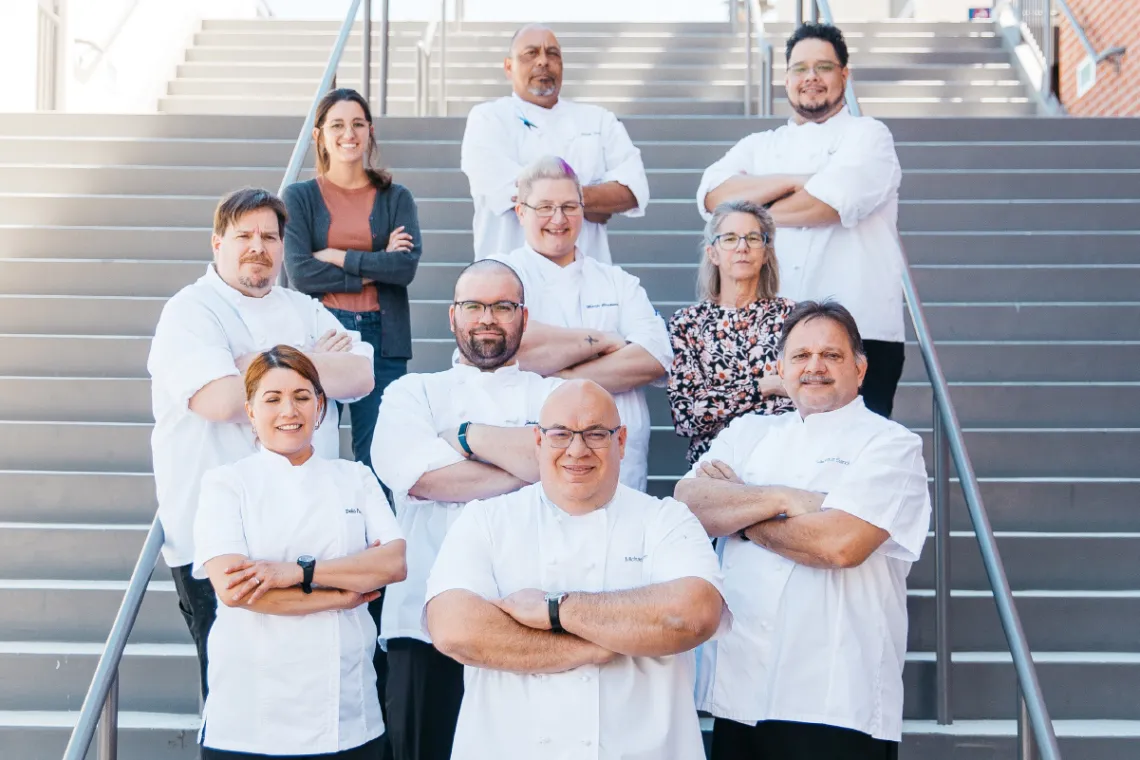 Catering team group photo with chefs