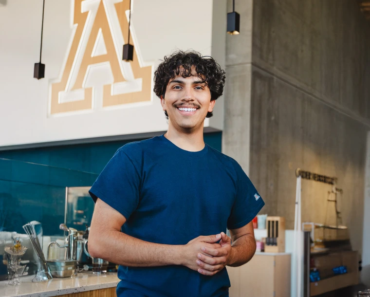 student employing facing camera